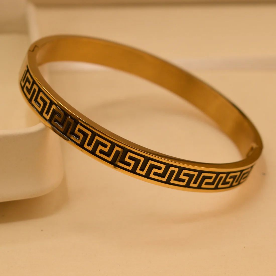 Elegant Gold Toned Bracelet With Classic Greek Key Pattern For Women
