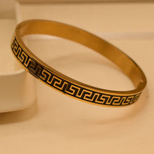 Elegant Gold Toned Bracelet With Classic Greek Key Pattern For Women