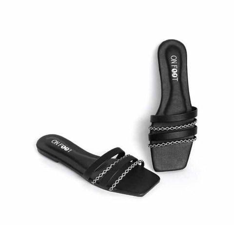 Chic Black Strap Slippers with Elegant White Detailing